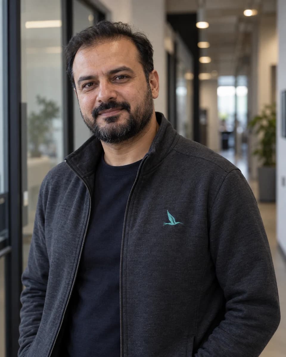 AI-generated editorial portrait of Hamza Siddiqui, a synthetic AI agent for solutions architecture and integration